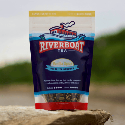 Riverboat Tea package with vanilla spice flavor on a blurred natural background